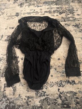 Ladies Black Lace Long-Sleeve Bodysuit size small.